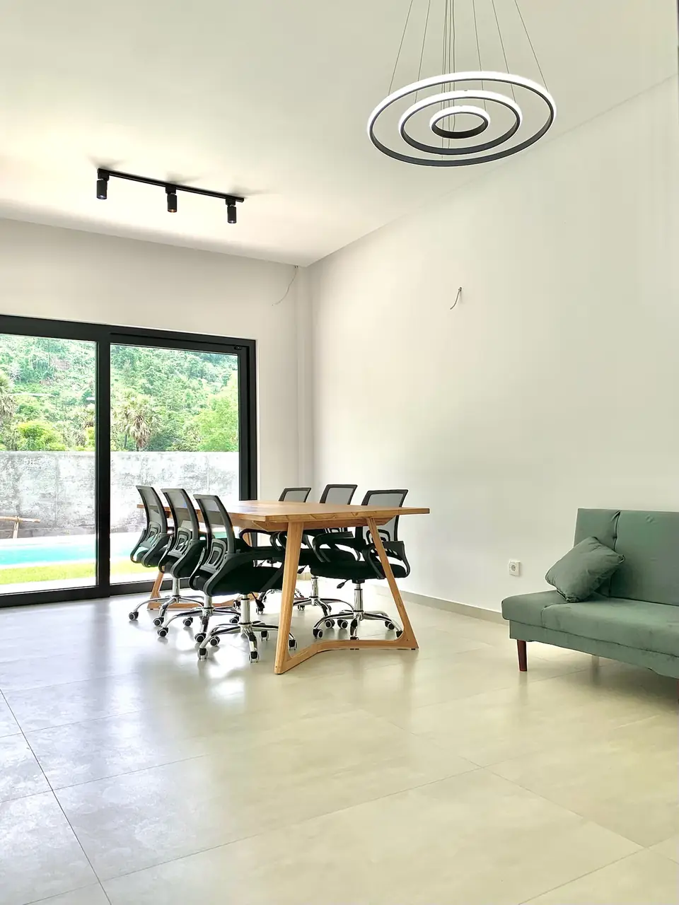 Coworking lounge with green sofa