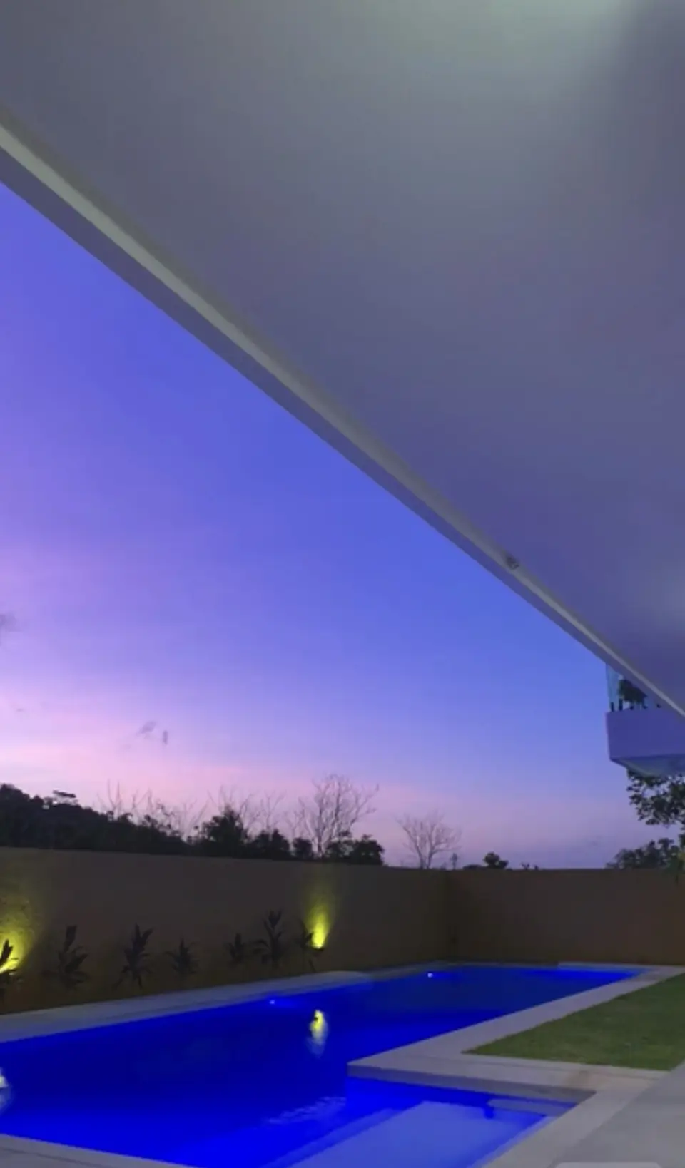 Pool at dusk with blue lighting